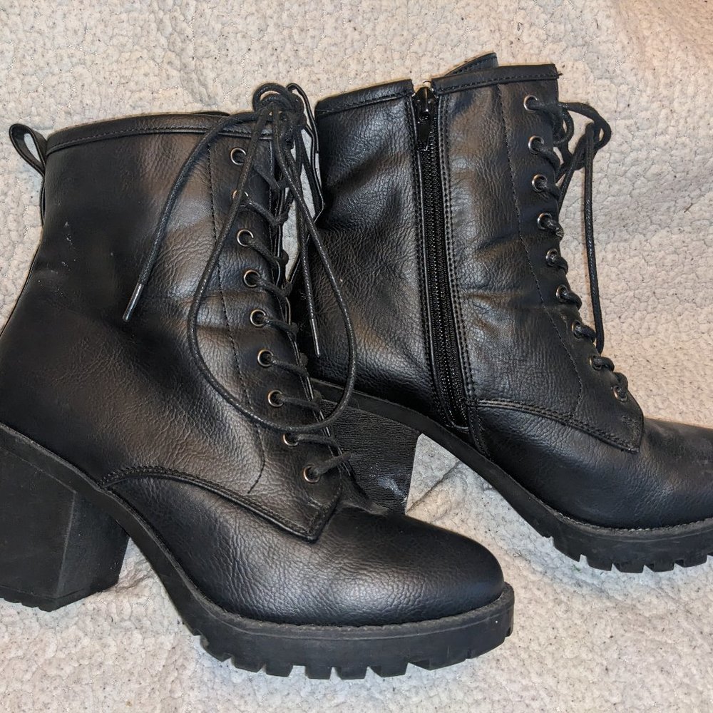 Black zip up heeled booties